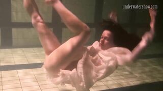 Brunette Teen Kristina Andreeva Swims Naked in the Pool