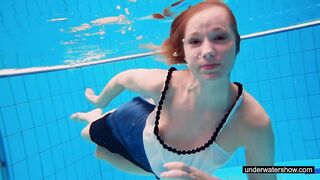 Teen Girl Avenna is Swimming in the Pool